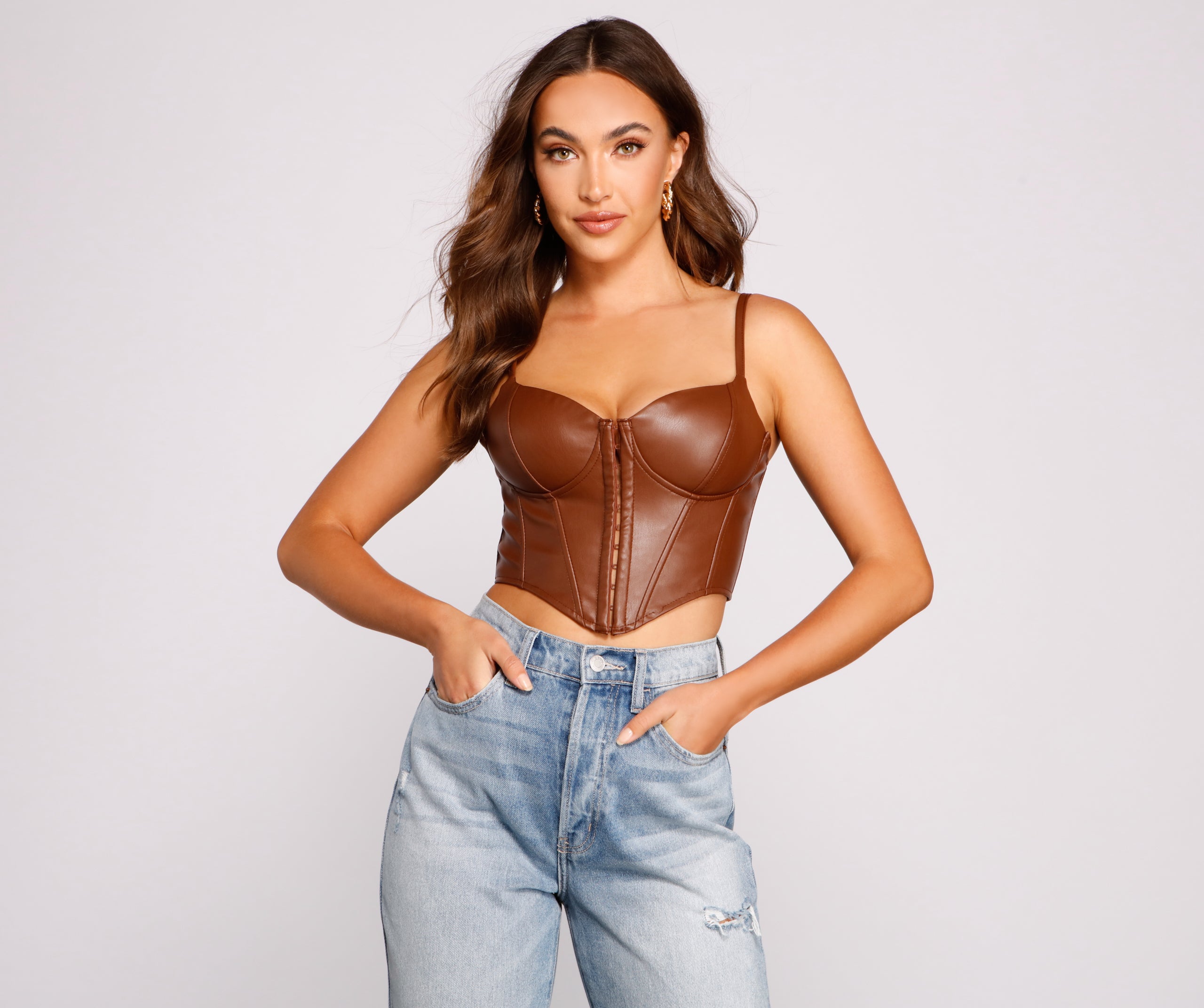 The waist-defining bodice style of the Bold Moment Faux Leather Corset Top is perfect for making a statement with your outfit and provides the boning, molded cups, or lace-up details that capture the corset trend.