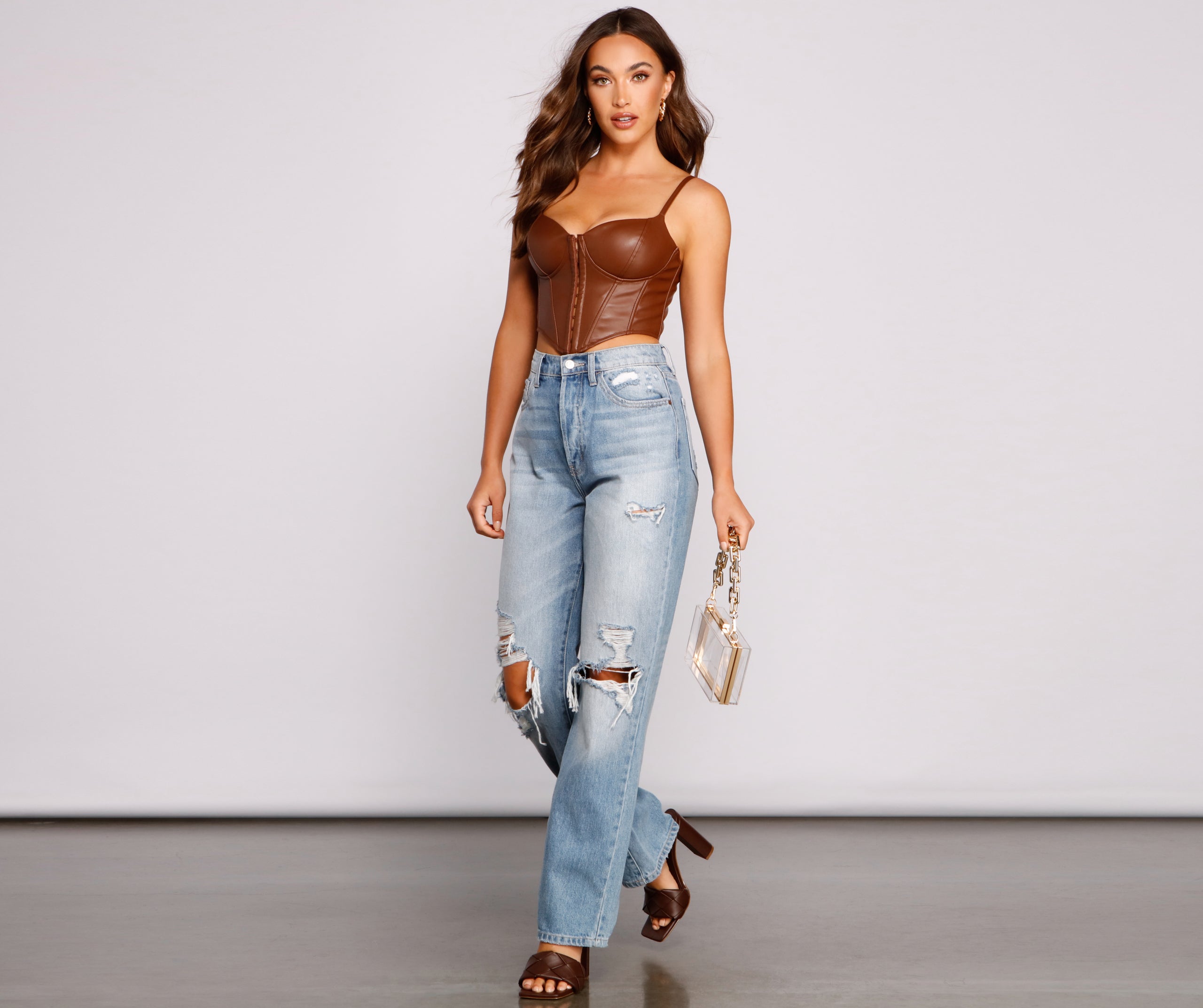 With fun and flirty details, Bold Moment Faux Leather Corset Top shows off your unique style for a trendy outfit for the summer season!