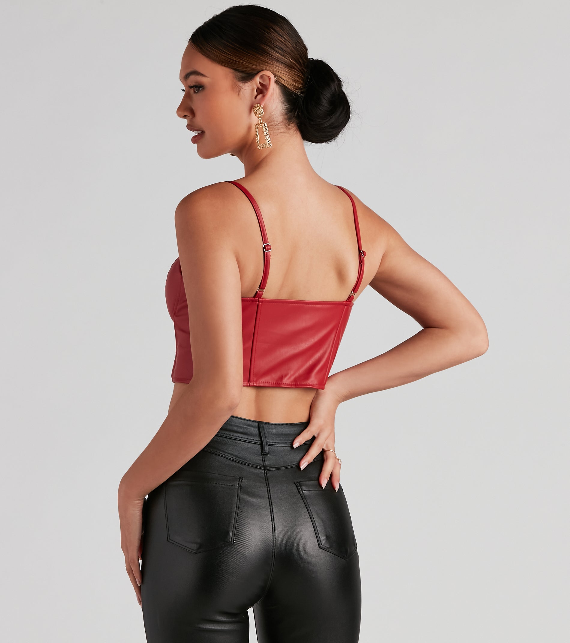 With fun and flirty details, the Bold Moment Faux Leather Corset Top shows off your unique style for a trendy outfit for summer!